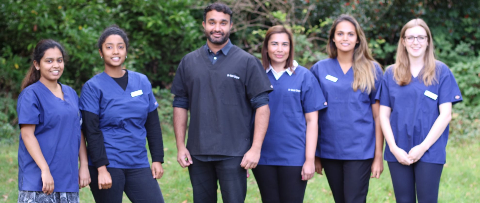 dentist_team_medium_letterbox_blurry-1980x840